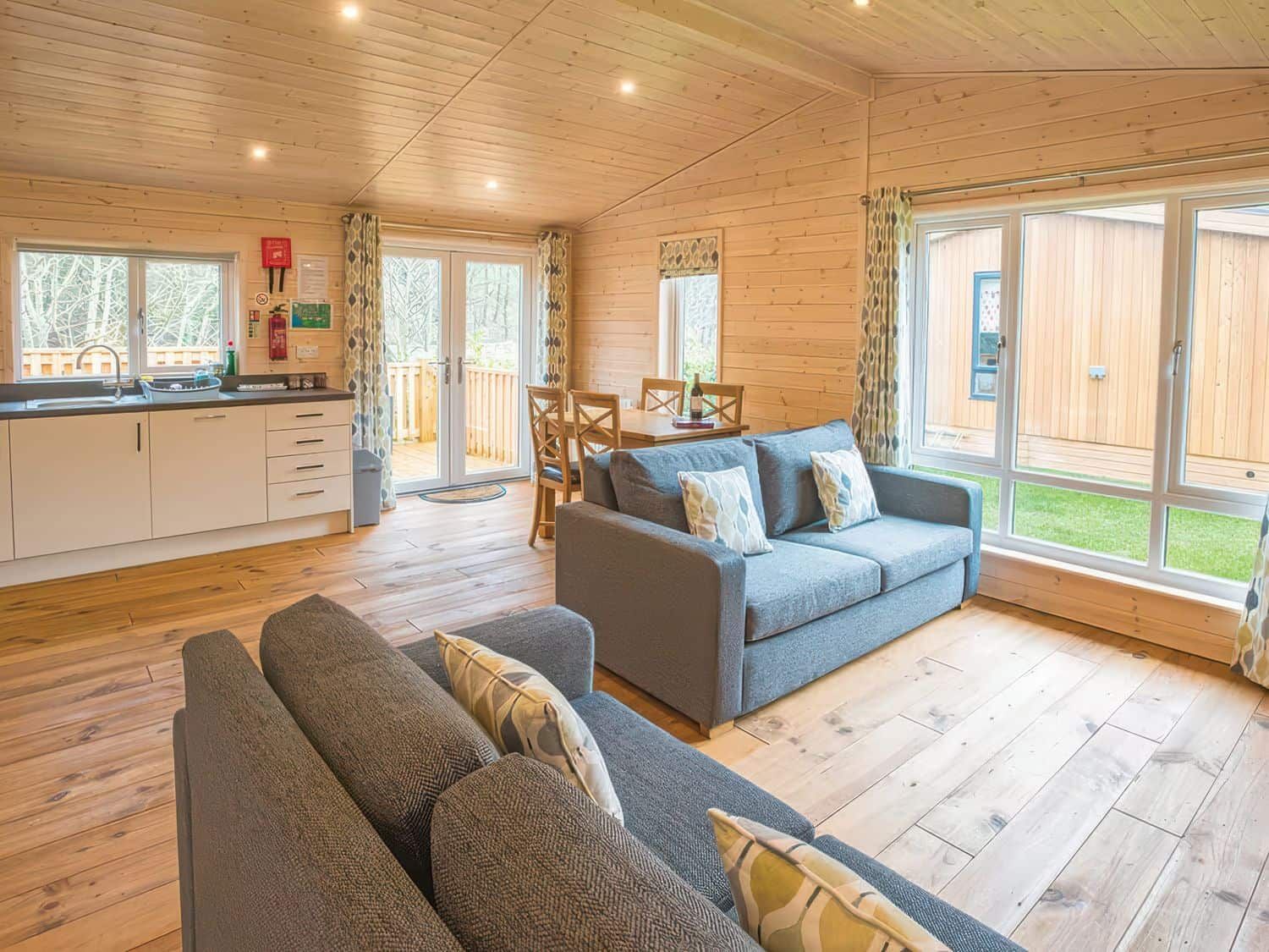 Comfortable living space with Smart TV and dog-friendly layout at Dovestone Lodge