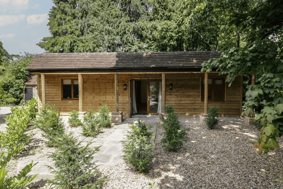Yew Tree Cottage log cabin exterior in Kent