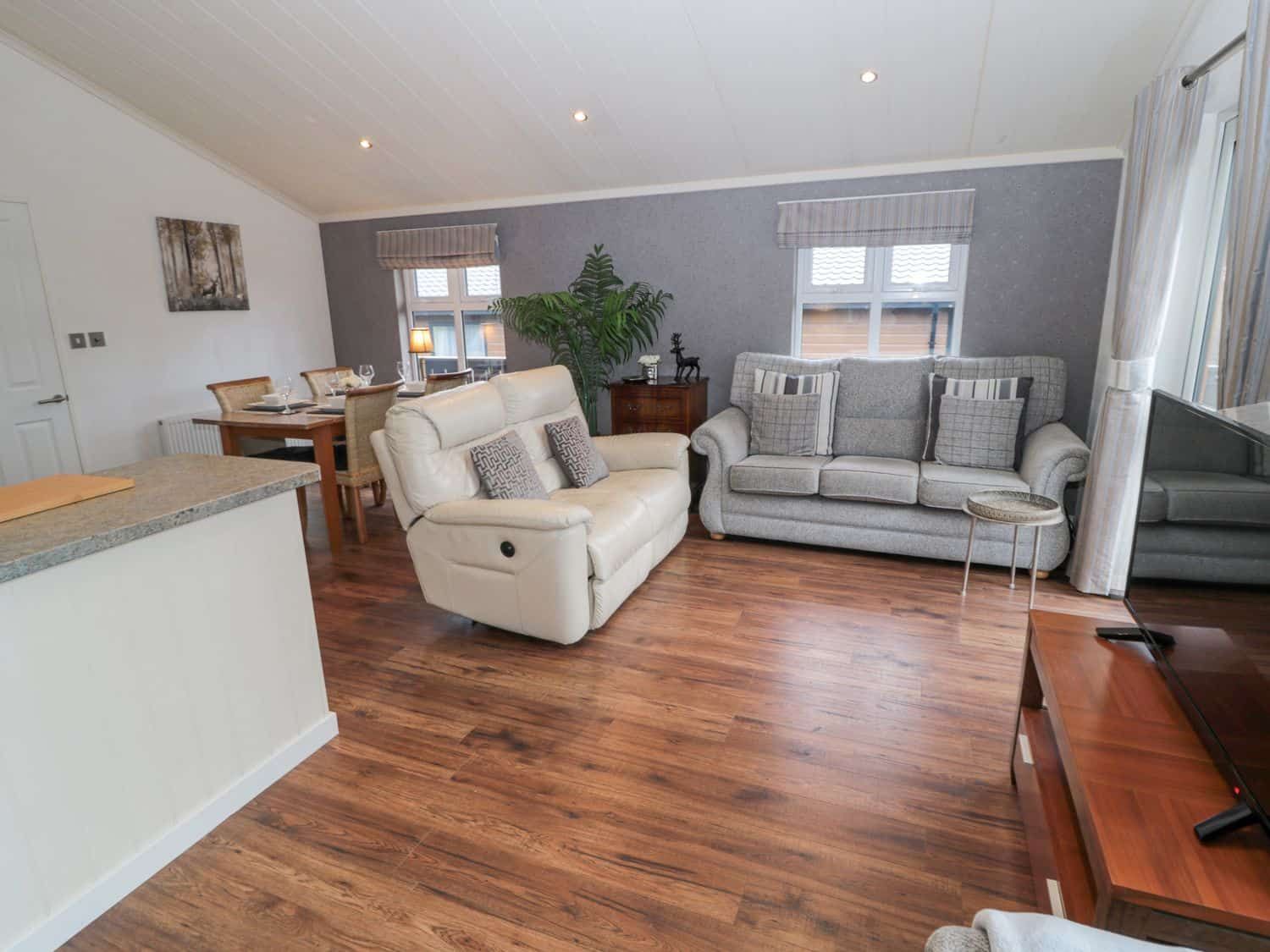 Modern living area with Smart TV and comfortable seating at Hillside View