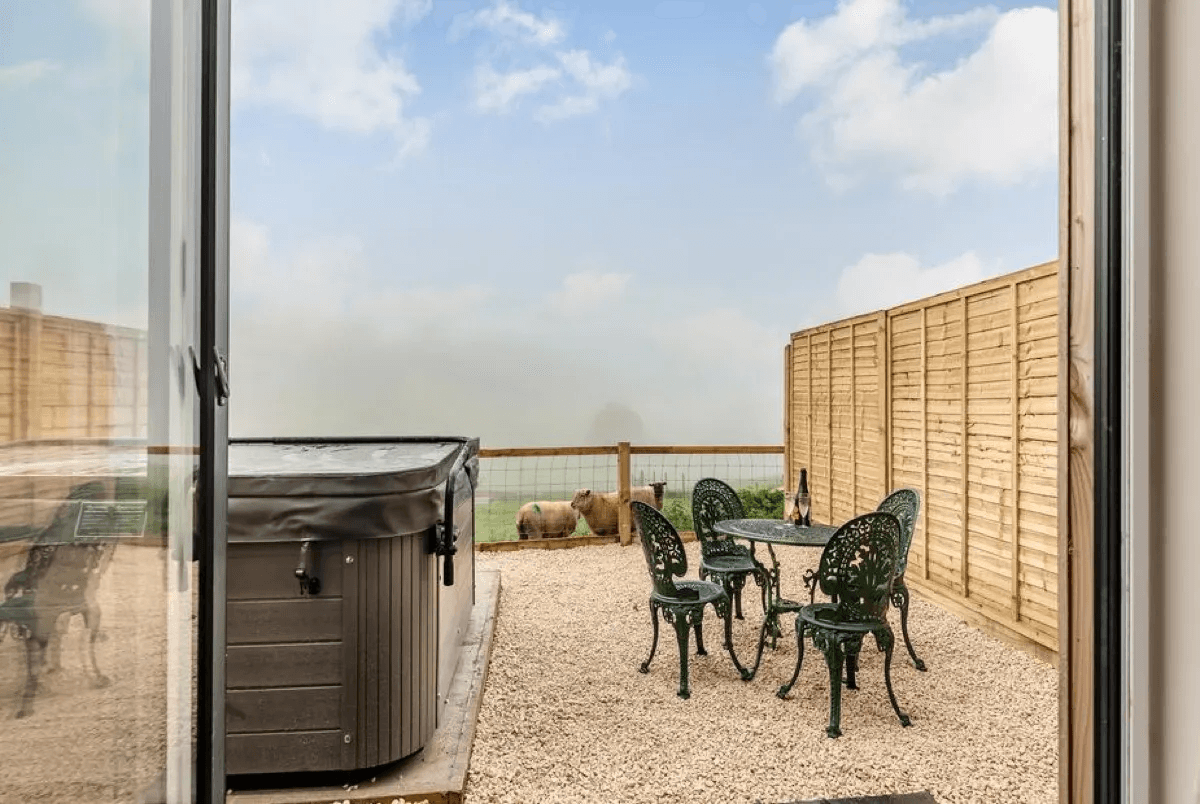 Private hot tub with valley views at Valley View Cottage