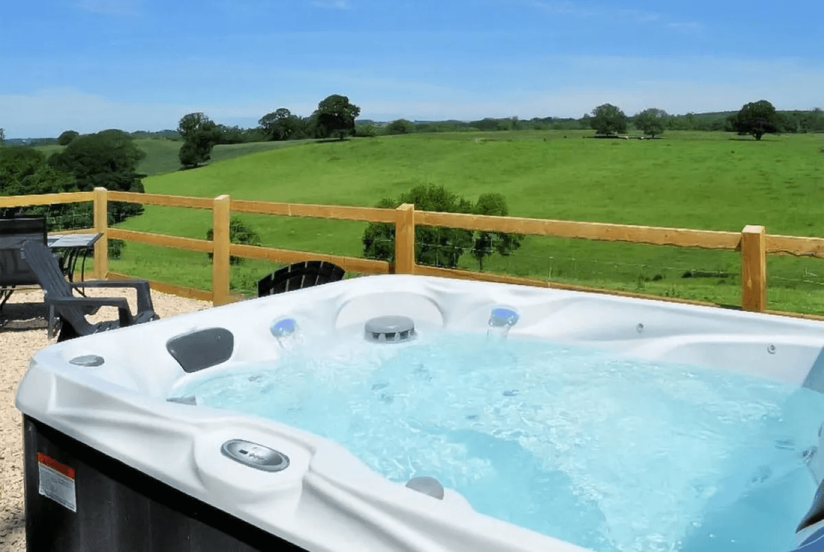 Private hot tub and firepit at Shepherds Hut Retreat