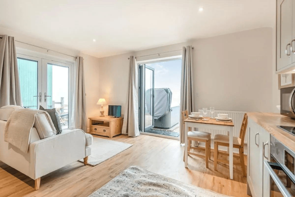 Open plan studio interior with panoramic views at Valley View Cottage