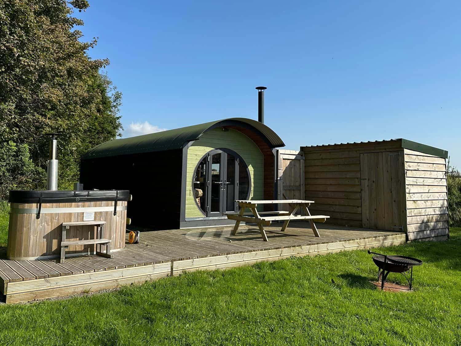 Hot tub with panoramic countryside views at Lime Kiln lodge