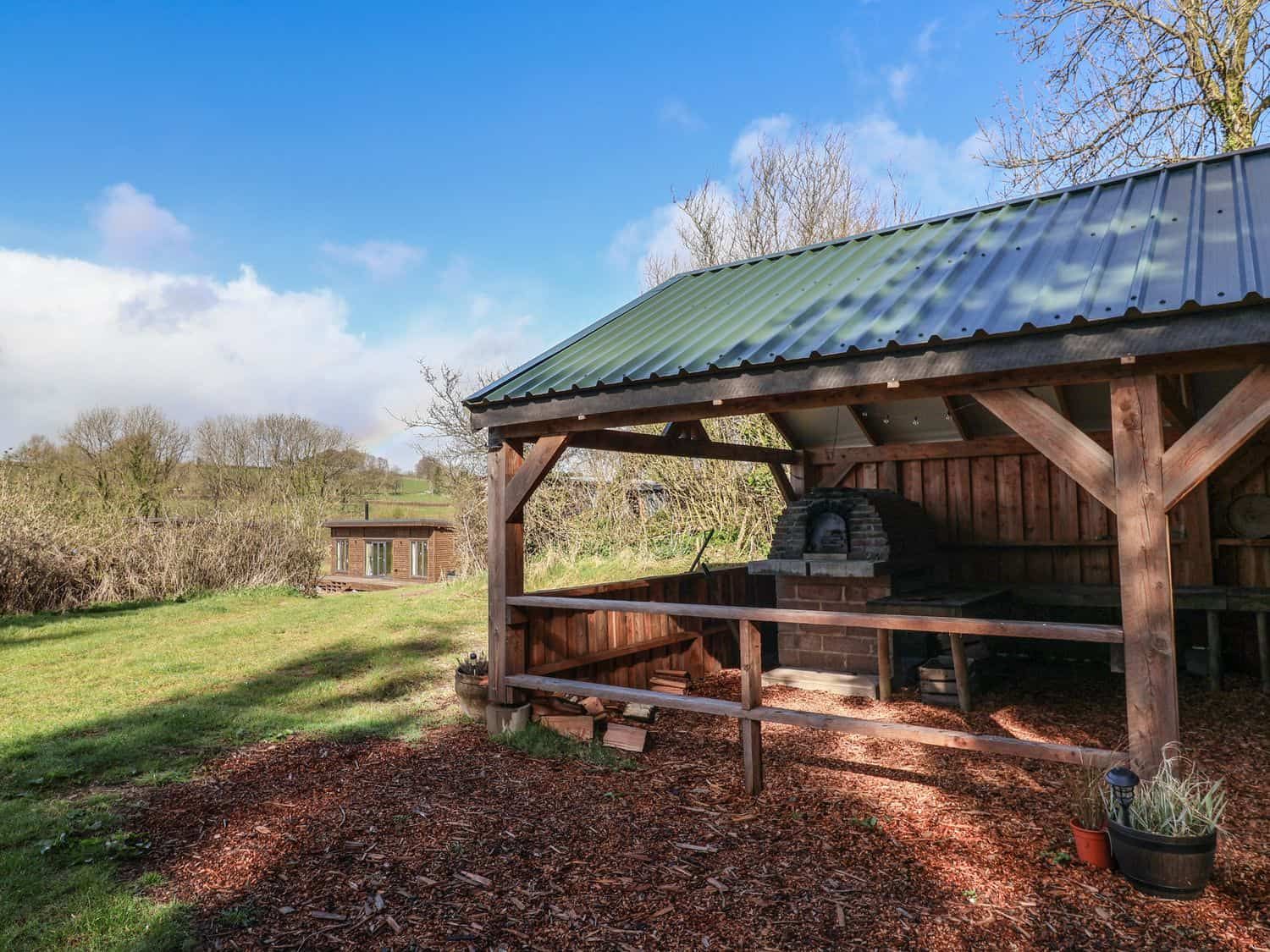 Private hot tub in secluded garden setting at Primrose Somerset